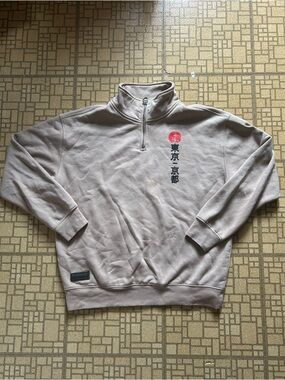 Primark Beige Quarter-Zip Sweater with Red Tokyo Graphic